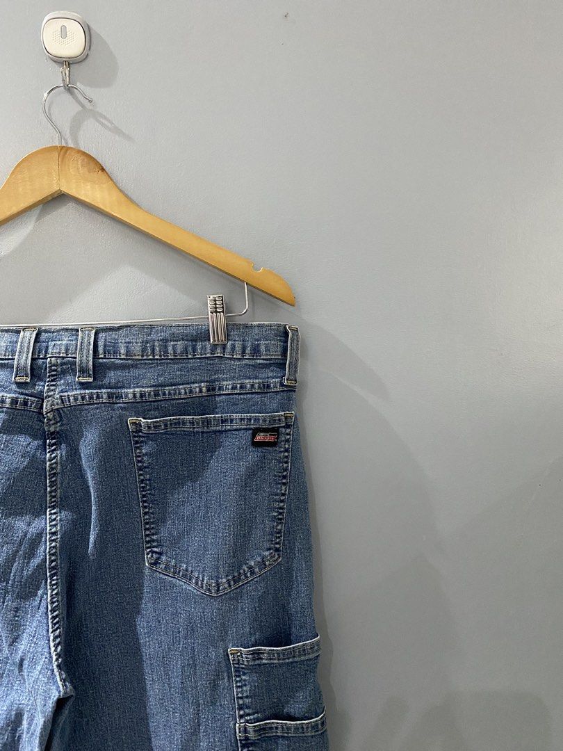Genuine Dickies Denim Cargo Shorts Size 38 (Category: Shorts) located in Bangued. Submitted by koroysthrifts (Listing ID 1469885576, Image 1). Description: - Brand: Genuine Dickies 38x23.5x10.5 - Item: Denim cargo shorts - Color: Blue - Size: 38 waist - Material: 82% cotton, 16% polyester, 2% spandex blend for extra stretch - Features: Multiple utility pockets including side cargo pockets, button closure with zip fly - Origin: Made in Mexico - Co