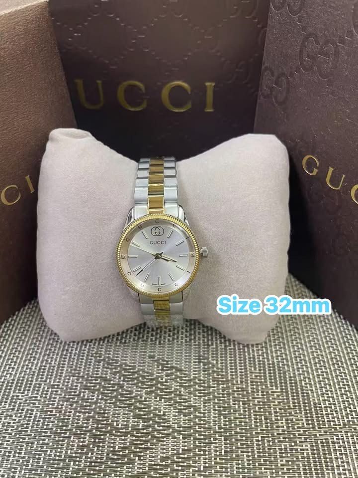 GG Couple Watch (Category: Women's Watches) located in Manila. Submitted by bagsandshoesmanymore (Listing ID 1469812492, Image 2). Description: Gucci Couple Watch Two tone gold Actual picture posted Paperbag, box and tag Stainless steel .