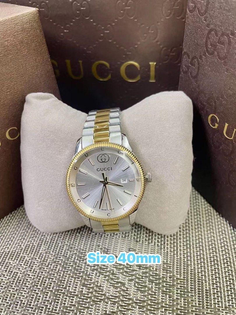 GG Couple Watch (Category: Women's Watches) located in Manila. Submitted by bagsandshoesmanymore (Listing ID 1469812492, Image 3). Description: Gucci Couple Watch Two tone gold Actual picture posted Paperbag, box and tag Stainless steel .