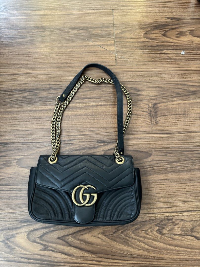 GG Marmont Matelasse Black (Category: Cross-body Bags) located in Rizal. Submitted by thrifty.mom (Listing ID 1469859393, Image 1). Description: - Brand: Gucci GG Marmont Shoulder Bag - Color: Classic Black - Material: Premium Leather with chevron quilting and back heart detail - Hardware: Antique brass with sliding chain strap and leather shoulder pad - Closure: Flap closure with iconic Interlocking G clasp Measurement 30cm Thrift find only No g