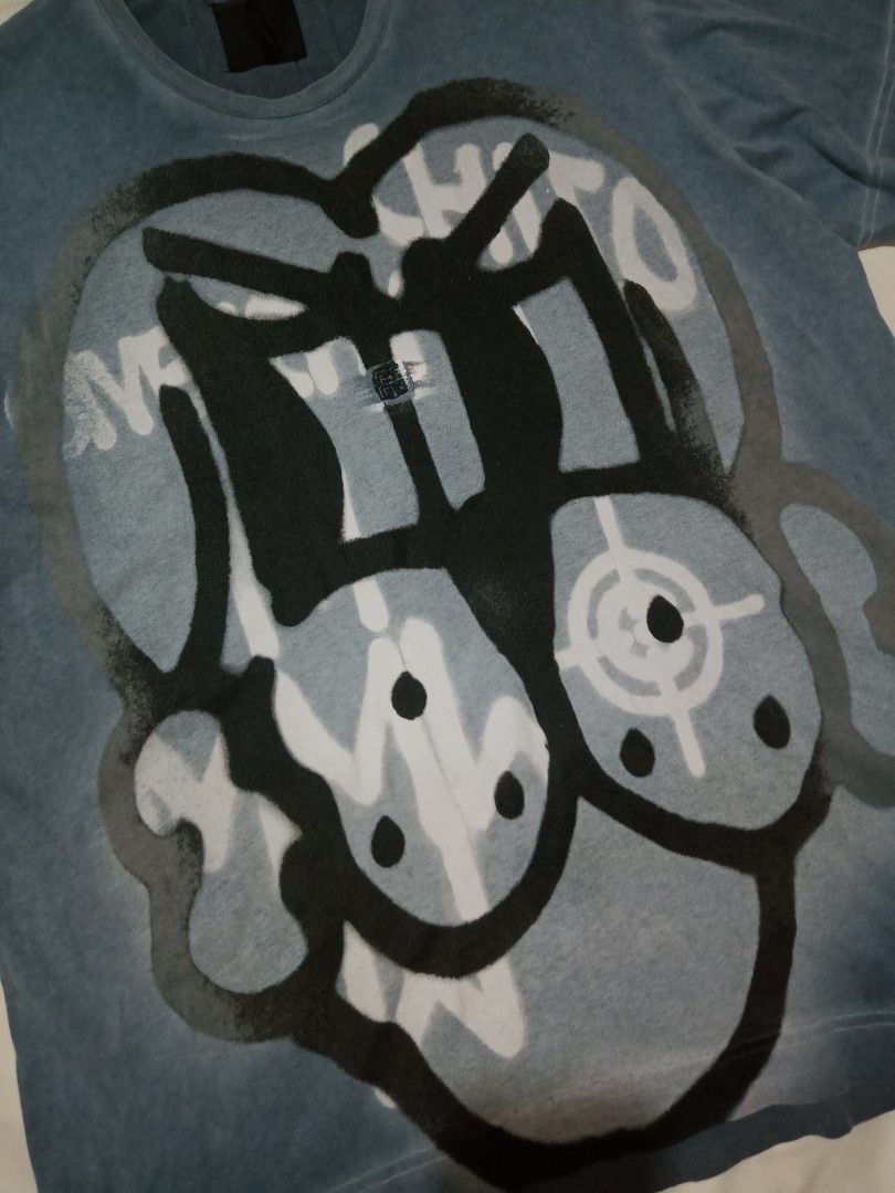 Givenchy x Chito Graffiti Spray Paint tee (Category: Tshirts & Polo Shirts ) located in Manila. Submitted by tres0824 (Listing ID 1469783251, Image 3). Description: Givenchy x Chito Graffiti Size xs oversized 22.5" width 28" length Verygood condition Issue had tiny pinhole (unnoticeable) 350 + Shipping fee Taguig location Dm to purchase📩📩.