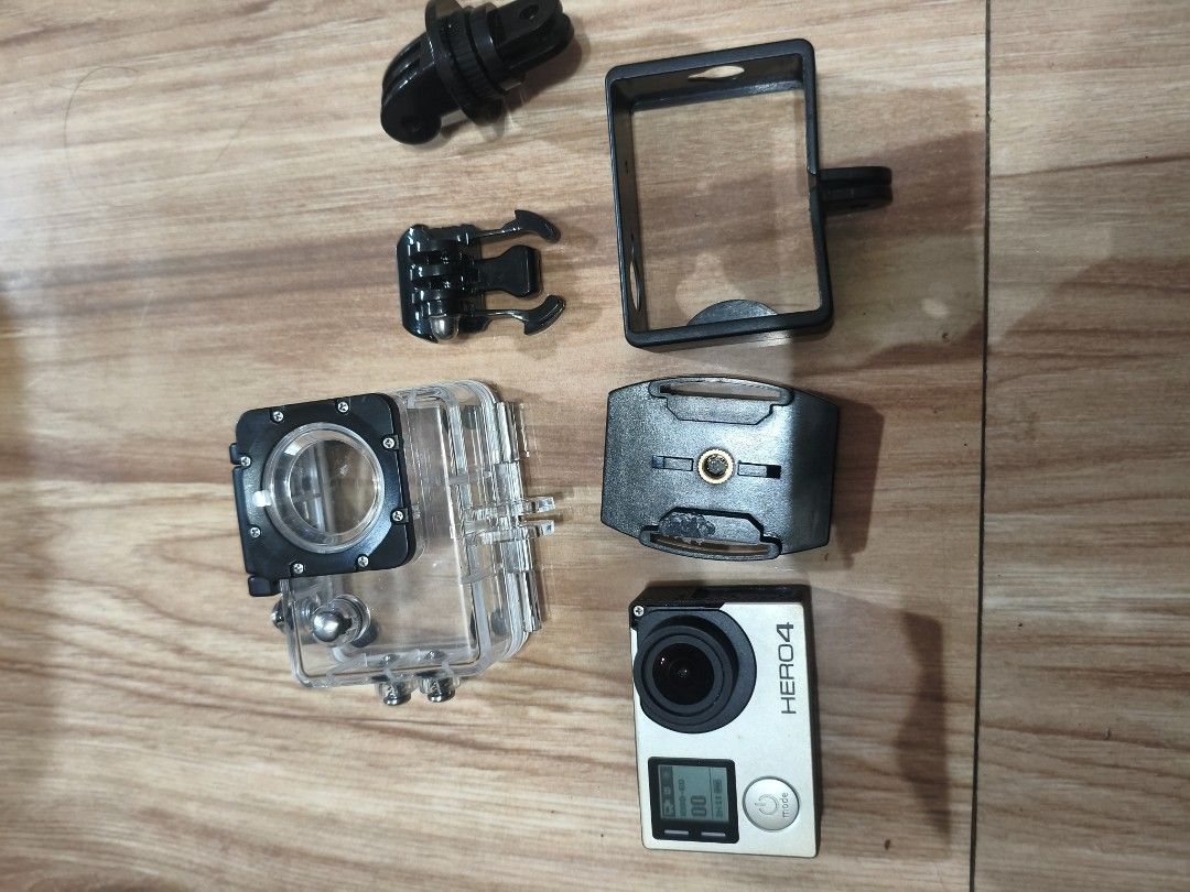 GoPro Hero 4 Action Camera with Housing and Mounts (Category: Cameras) located in Baguio. Submitted by baguiobeans (Listing ID 1469807321, Image 1). Description: - GoPro Hero 4 Silver action camera bundle - Shoots stunning video at 4K and 2.7K resolutions up to 60fps with a wide field of view - Fully tested, powers on, and navigates menus smoothly - Includes waterproof housing case, frame mount, buckle mounts, and base mounts - Body shows normal 