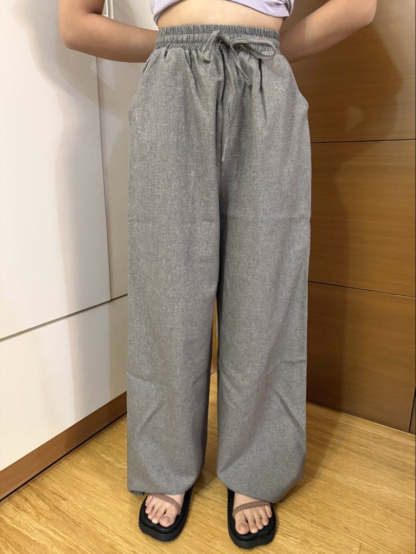 Gray Garterized Trousers from Bangkok (Category: Other Bottoms) located in Quezon City. Submitted by hazpreloved (Listing ID 1469889660, Image 1). Description: Purchased in Bangkok Garterized, Fits upto waist 24-25” End-to-end length 41” Actual photos posted Discounts available for bulk orders Tags: GU, uniqlo, bershka, cotton on, h&m, mango, love bonito.