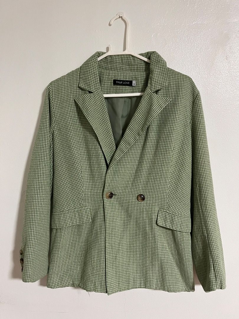 Green Houndstooth Patterned Blazer Jacket (Category: Coats, Jackets and Outerwear) located in Cabuyao City. Submitted by rdtrmt (Listing ID 1469866220, Image 1). Description: - Style: Green houndstooth blazer with a structured fit - Details: Standard lapel collar and button cuffs on both sleeves - Versatility: Great layering piece for smart casual outfits or office wear - Condition: Clean fabric, well-kept.