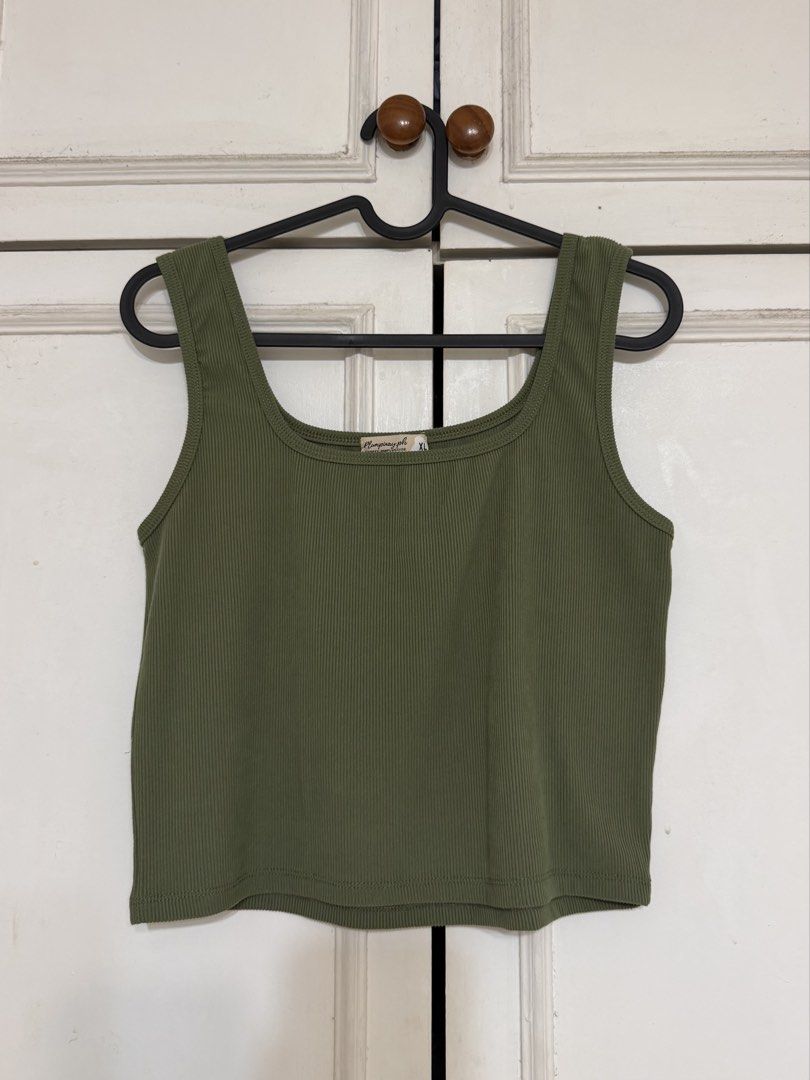 Green Ribbed Square Neck Tank Top Size XL (Category: Sleeveless) located in Rizal. Submitted by rianaht (Listing ID 1469931337, Image 1). Description: - Brand: Plumpinayph - Size: XL - Color: Green - Neckline: Square neckline with thick straps - Fit: Cropped hemline - Fabric: Soft stretch fabric - Condition: Brand new with tag attached at the collar - Style: Casual basic top, easy to pair with jeans or shorts 🌸 RFS: Decluttering 🌸 Delivery only