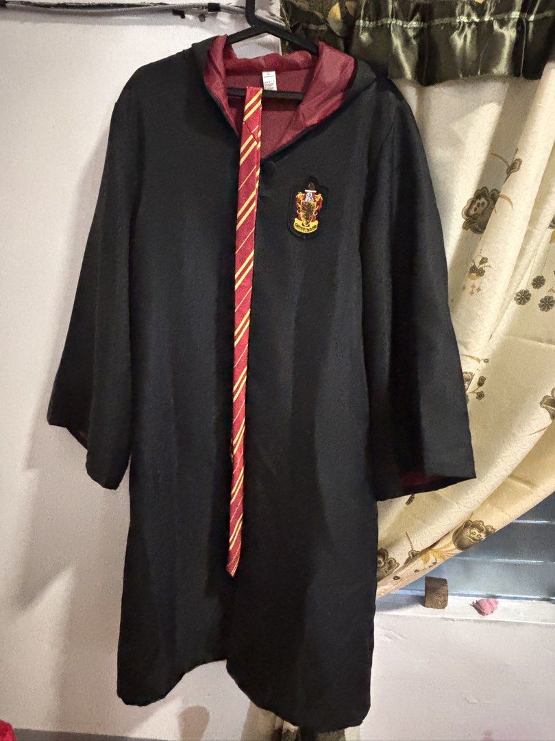 Gryffindor harry potter robe (Category: Coats, Jackets and Outerwear) located in Manila. Submitted by shyyyramae (Listing ID 1469898135, Image 1). Description: Comes with tie. Use only once. Bought this for 1k. Price negotiable.