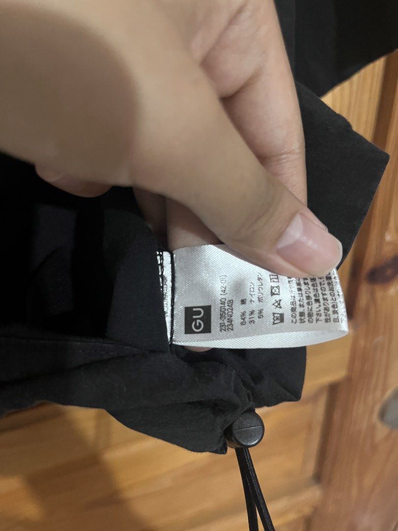 GU Black Short Sleeve Button-Up Shirt with Drawstring (Category: Shirts) located in Baguio. Submitted by gbwardrobe (Listing ID 1469884310, Image 2). Description: .
