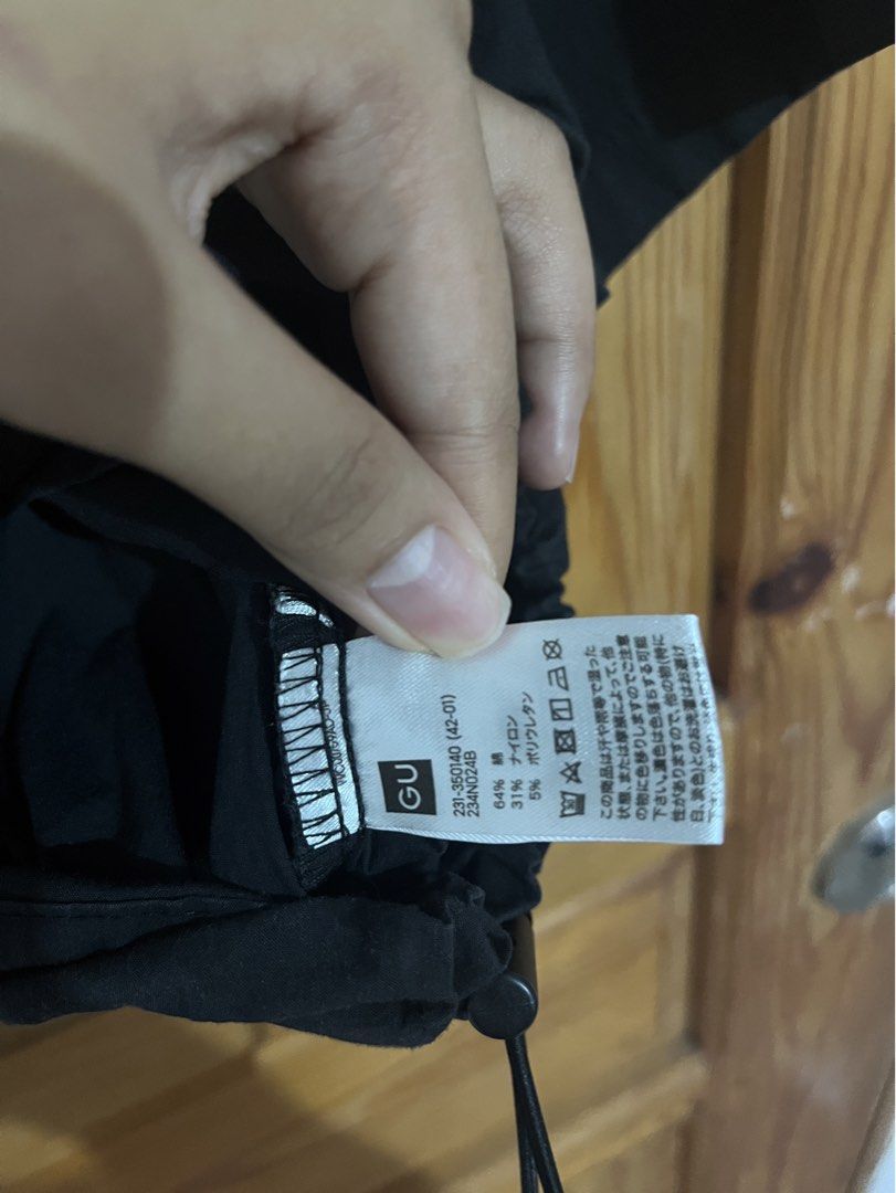 GU Black Short Sleeve Button-Up Shirt with Drawstring (Category: Shirts) located in Baguio. Submitted by gbwardrobe (Listing ID 1469884310, Image 3). Description: .