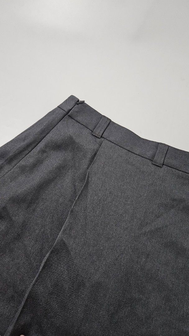 GU Dark Grey Pleated Skirt Size L (Category: Skirts) located in Alfonso. Submitted by jbcamet (Listing ID 1469861728, Image 2). Description: - Brand/Model: GU Pleated Skirt - Color: Dark Grey - Size: L (Waist: approx. 70cm) - Material: Polyester with recycled content - Features: Clean structured look, belt loops - Styling: Great for casual and smart casual wear, pairs easily with blouses or t-shirts.