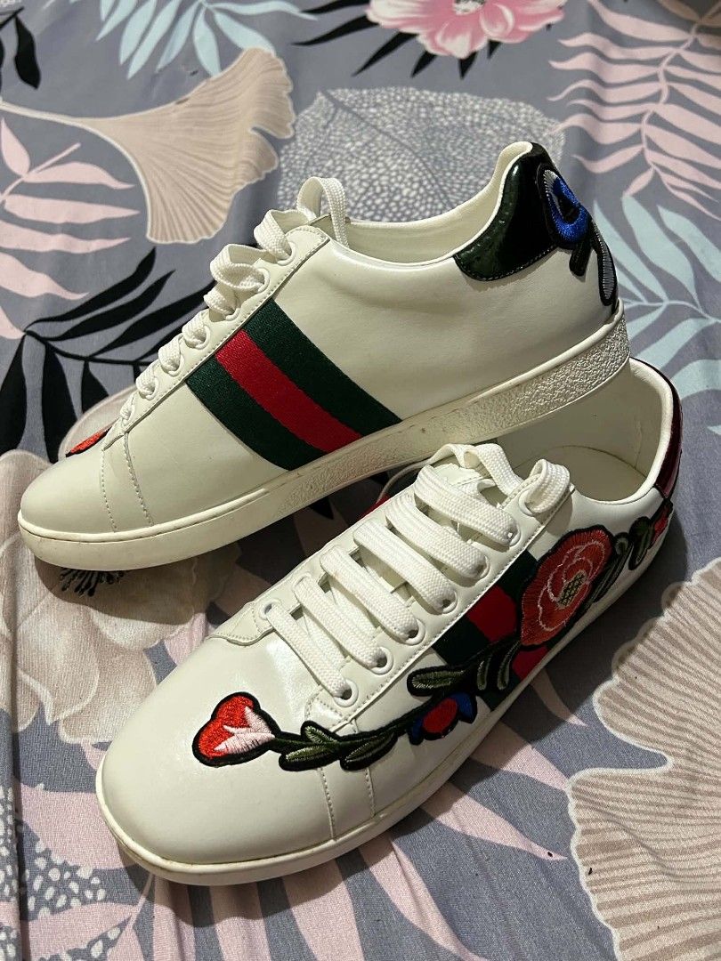 Gucci Ace Embroidered Sneaker White Floral (Category: Sneakers) located in Quezon City. Submitted by yyyahhhhhh (Listing ID 1469908004, Image 3). Description: - Gucci White Leather Low-Top Sneakers - Signature green and red web stripe on the sides - Stunning multicolored floral embroidery along the uppers - Clean white laces and durable rubber soles - Bought in Italy - EU 44-45 / UK 11 / US 13.