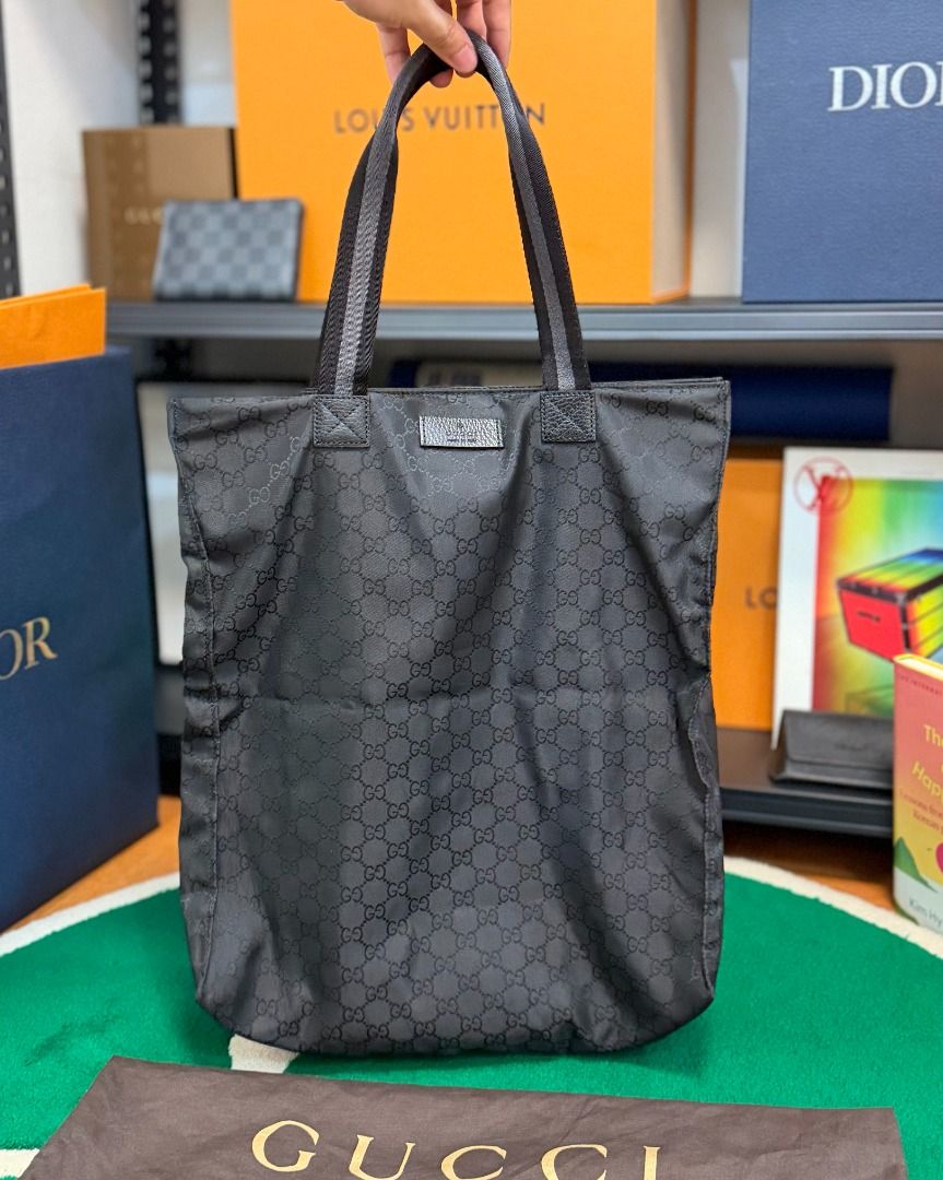 Gucci Black Nylon Web Tote Bag (Category: Luxury Bags & Wallets) located in Cavite. Submitted by southsnkr (Listing ID 1469869619, Image 1). Description: Gucci Black Nylon Web Tote Bag Gently Used Inclusion: dust bag ₱15,000 only (45k+ SRP) Cavite / Bulacan 📍 Add for shipping Mode of Payment: BPI | G-cash 𝗔𝗹𝗹 𝘁𝗿𝗮𝗱𝗲𝗺𝗮𝗿𝗸𝘀 𝗮𝗻𝗱 𝗹𝗼𝗴𝗼𝘀, 𝗶𝗻𝗰𝗹𝘂𝗱𝗶𝗻𝗴 𝘁𝗵𝗼𝘀𝗲 𝗼𝗳 𝗡𝗶𝗸𝗲, 𝗔𝗱𝗶𝗱𝗮𝘀, 𝗮𝗻𝗱 𝗼𝘁𝗵𝗲𝗿 𝗯𝗿𝗮𝗻𝗱𝘀, 𝗮𝗿