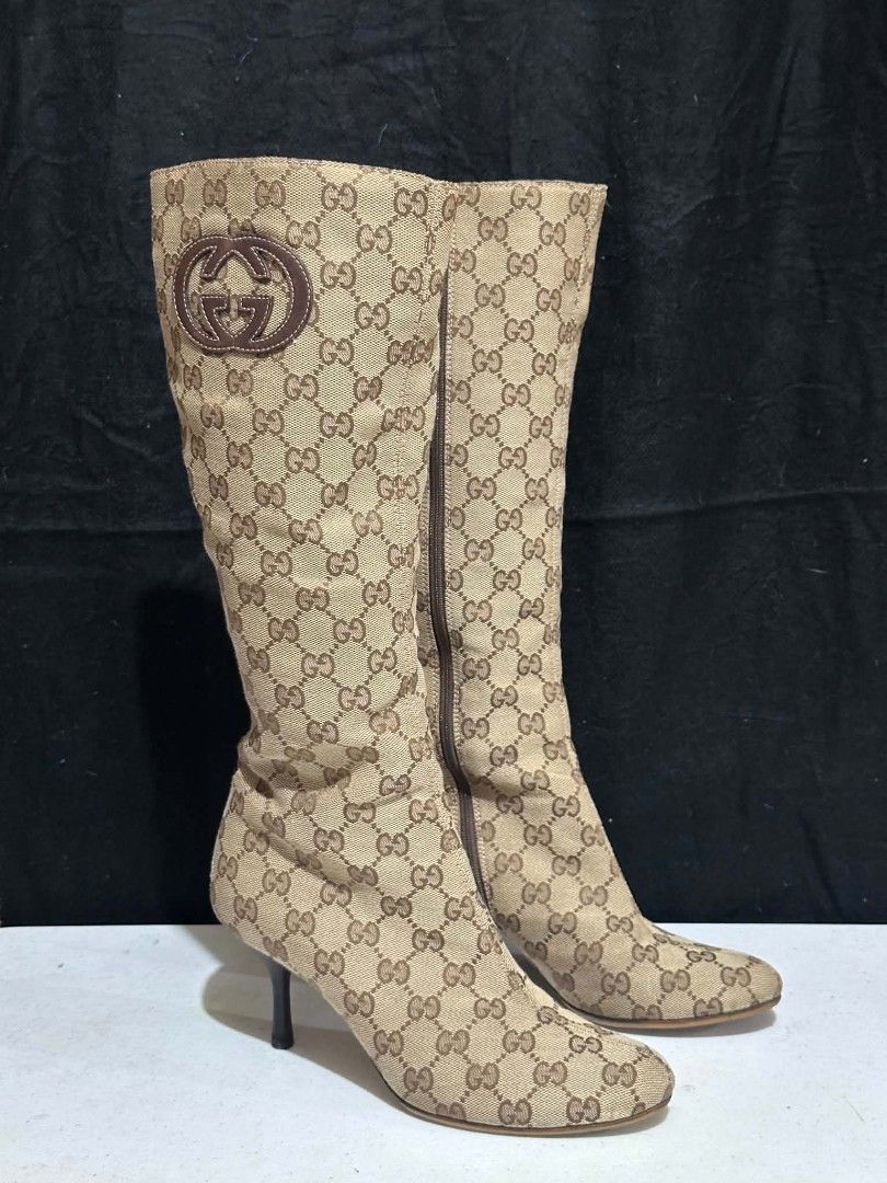 GUCCI boots EUR 36 (Category: Boots) located in Daraga. Submitted by donjim (Listing ID 1469840175, Image 3). Description: Authentic Gucci monogram boots, size 36C on label, 2" heel height, with minor signs of usage. Installed with Topy in the sole for protection..