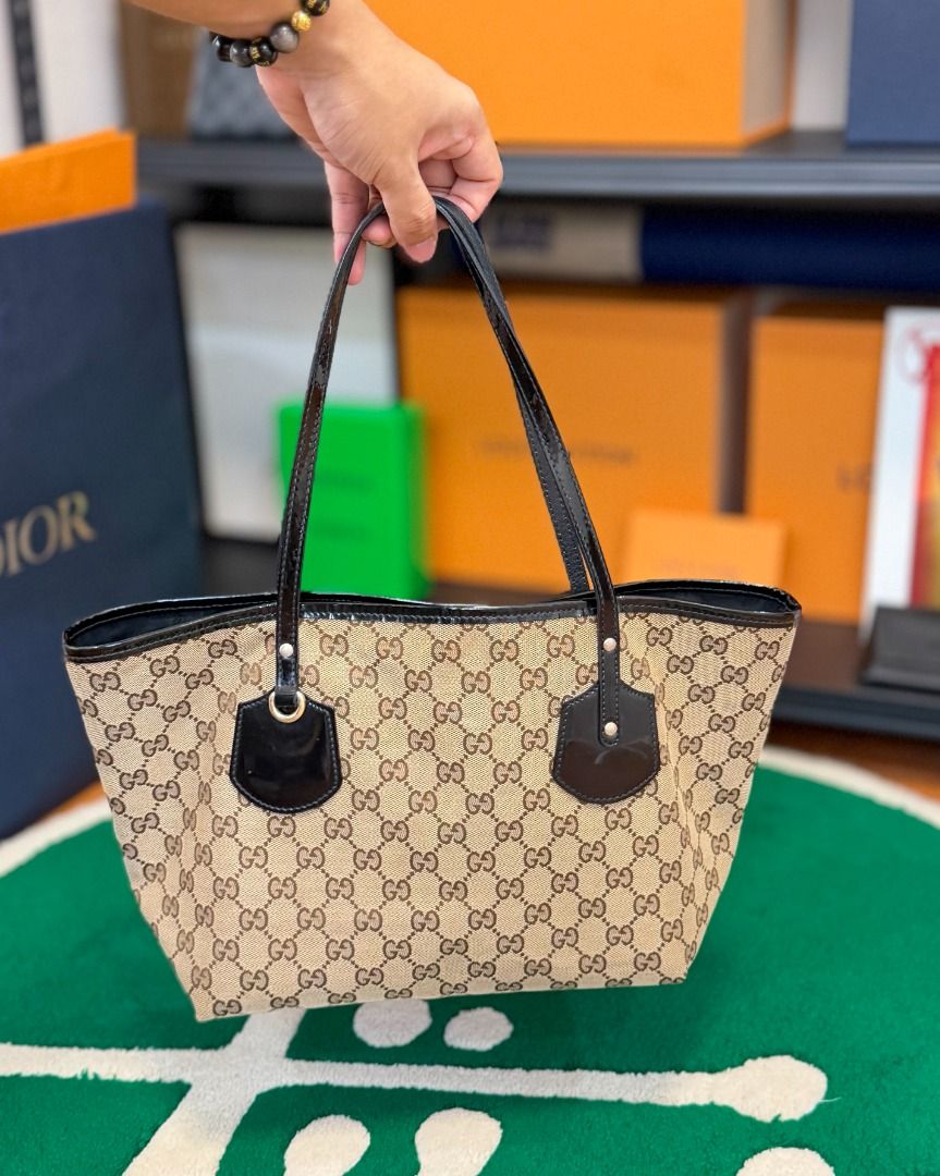 Gucci Canvas Jolie Tote Bag (Category: Luxury Bags & Wallets) located in Cavite. Submitted by southsnkr (Listing ID 1469869911, Image 1). Description: Gucci Canvas Jolie Tote Bag Gently Used No inclusions ₱19,000 only Cavite / Bulacan 📍 Add for shipping Mode of Payment: BPI | G-cash 𝗔𝗹𝗹 𝘁𝗿𝗮𝗱𝗲𝗺𝗮𝗿𝗸𝘀 𝗮𝗻𝗱 𝗹𝗼𝗴𝗼𝘀, 𝗶𝗻𝗰𝗹𝘂𝗱𝗶𝗻𝗴 𝘁𝗵𝗼𝘀𝗲 𝗼𝗳 𝗡𝗶𝗸𝗲, 𝗔𝗱𝗶𝗱𝗮𝘀, 𝗮𝗻𝗱 𝗼𝘁𝗵𝗲𝗿 𝗯𝗿𝗮𝗻𝗱𝘀, 𝗮𝗿𝗲 𝘁𝗵𝗲 𝗽𝗿𝗼𝗽𝗲𝗿�