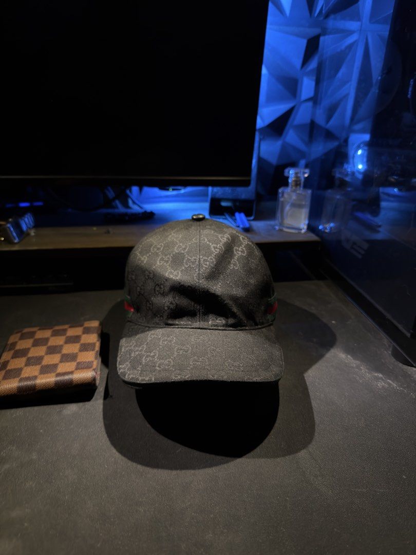 Gucci GG Monogram Canvas Black (Category: Luxury Apparel) located in Manila. Submitted by tindero-ng-damit (Listing ID 1469899958, Image 3). Description: Gucci GG Monogram - Black Canvas Material - Leather Strap No issue - Flawless Complete tags I got Size M and L Cap Box Replacement will be provided upon shipment.