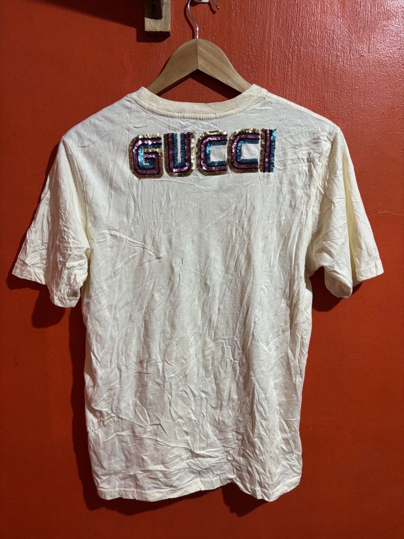 Gucci Maison De L'Amour Sequin Tee (Category: Shirts) located in Naga. Submitted by ajrc.shop (Listing ID 1469911127, Image 2). Description: Gucci Maison Dlamour ✅Size: S ✅Width: 18.5 ✅Length: 21.5 ✅Color Rate: 9/10 ✅Issue: None ✅Need Wash ✅Location: Bicol Naga City, Camarines Sur ✅Courier: J&T Express/Flash Express ✅MOP: Gcash only.