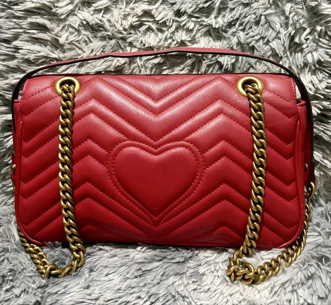 Gucci Marmont (Category: Luxury Bags & Wallets) located in Manila. Submitted by jlj_v.2_oshop (Listing ID 1469827915, Image 2). Description: Gucci GG Marmont matelassé shoulder bag, most identifiable by its signature chevron-quilted leather, iconic interlocking Double G hardware, and sliding chain-and-leather strap. Medium size. These preloved bags and shoes are sourced from Japan, Korea, and Thailand through a seller friend. They are well-loved 