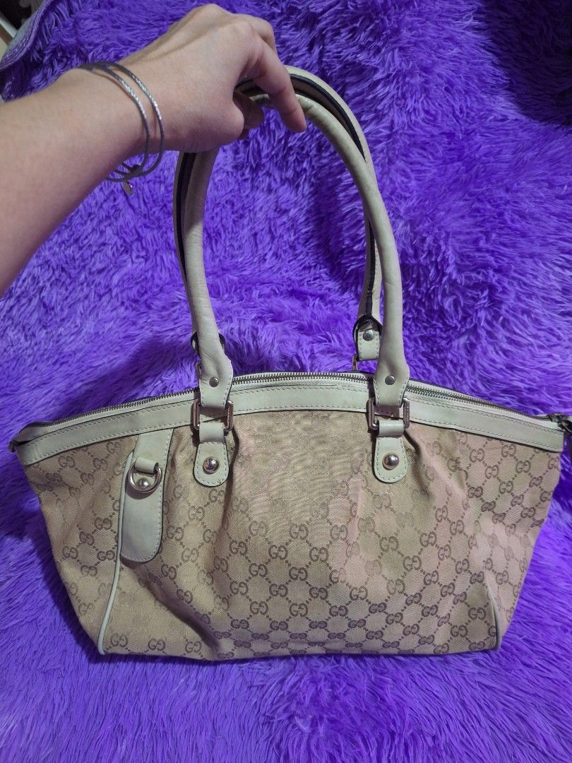 Gucci Monogram Canvas Tote Bag Cream (Category: Luxury Bags & Wallets) located in Quezon City. Submitted by cloudymay (Listing ID 1469933946, Image 1). Description: - Brand: Gucci - Style: Monogram canvas tote bag - Colorway: Beige and cream - Hardware: Silver-tone with branded snap button accents - Closure: Top zip closure - Interior: Fabric lining with branded zipper pull - Condition: no visible runs on canvass. looks clean, 9/10. - Very Pretty