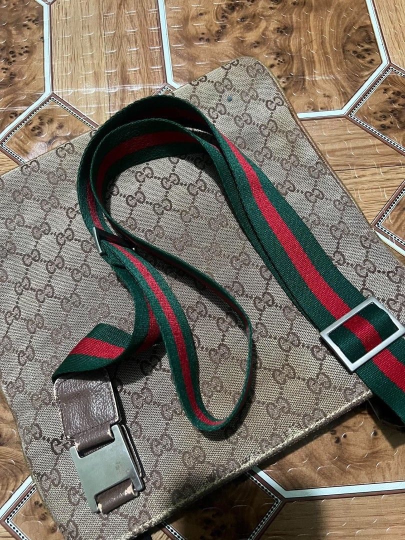Gucci Monogram Crossbody Bag with Web Stripe (Category: Luxury Bags & Wallets) located in Cagayan de Oro. Submitted by friderickv99131 (Listing ID 1469921500, Image 2). Description: Gucci crossbody messenger bag - Iconic beige and brown GG monogram canvas with brown leather trim - Signature green and red web stripe with silver-tone hardware - Convenient front zip pocket for quick access - Unique horsebit buckle detail for an elevated look - Adjus