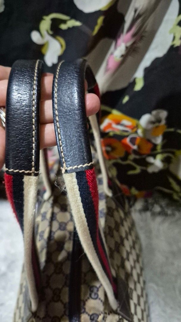 Gucci Monogram Tote Bag Blue Beige Canvas (Category: Luxury Bags & Wallets) located in Baguio. Submitted by jhaz_bags (Listing ID 1469901984, Image 3). Description: - Authentic Classic Gucci Tote Bag - Blue & beige GG monogram canvas with leather trim - Iconic red & white web stripe handles - Secure zip top closure - Spacious dark fabric-lined interior with zipper & slip pockets - Serial number stamped on interior leather tag - Perfect, roomy eve