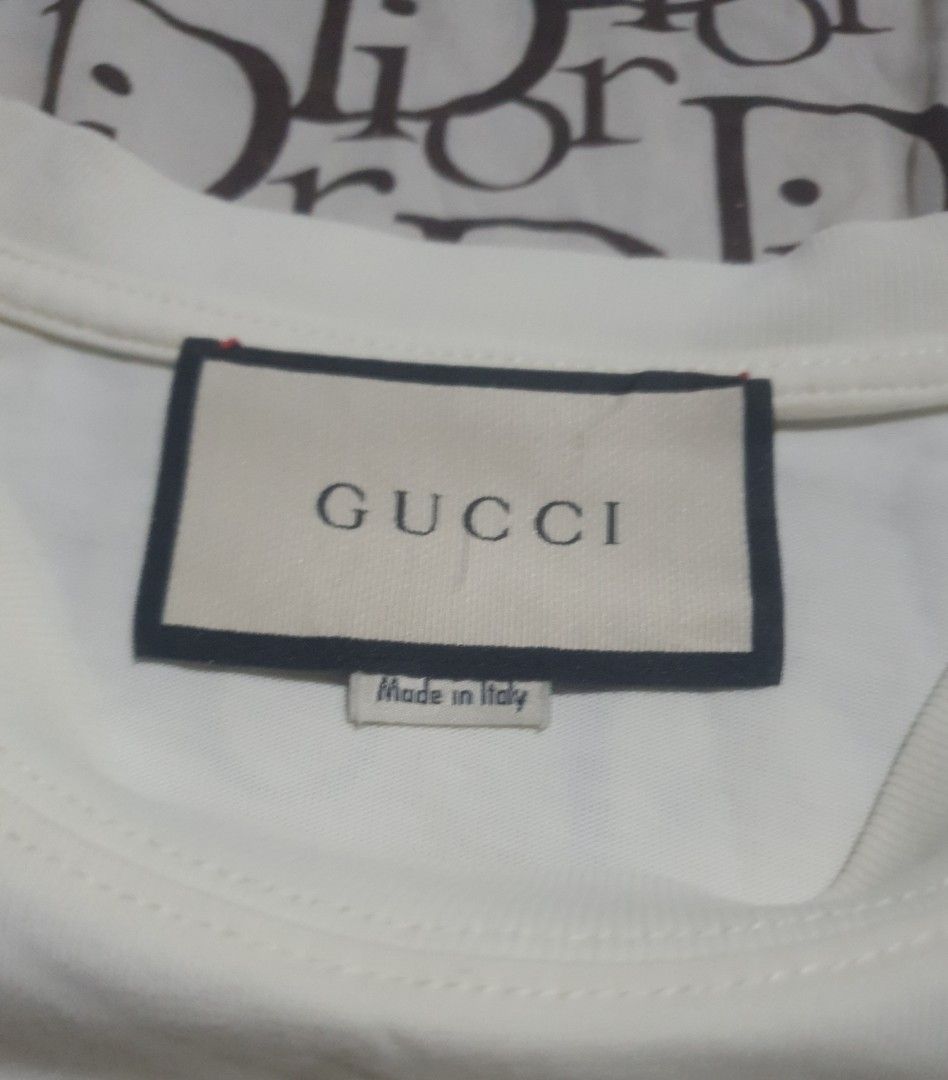 Gucci skating tshirt (Category: Tshirts & Polo Shirts ) located in San Fernando. Submitted by retro.district. (Listing ID 1469896705, Image 3). Description: - Gucci skating tshirt - Size: XL (23x29) - Condition: Excellent - issue: Removable stain - Color Rate: 9.5/10 (Cream).