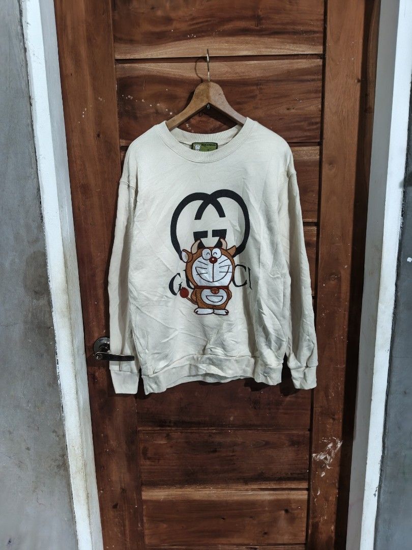 GUCCIxDORAEMON CREWNECK (Category: Coats, Jackets and Outerwear) located in Tagum. Submitted by danelle_closet1106 (Listing ID 1469790441, Image 1). Description: EXCELLENT SIZE:LARGE MENS NO ISSUE NEEDWASH ONLY.