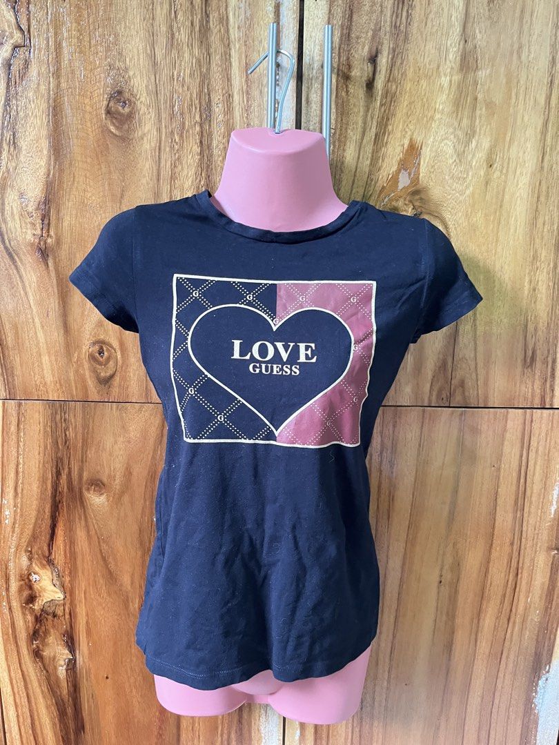 Guess Black Shirt (Category: Shirts) located in Cabanatuan. Submitted by winx_closeth (Listing ID 1469831954, Image 1). Description: 12 yr old kids, but can fit to xs-small women.