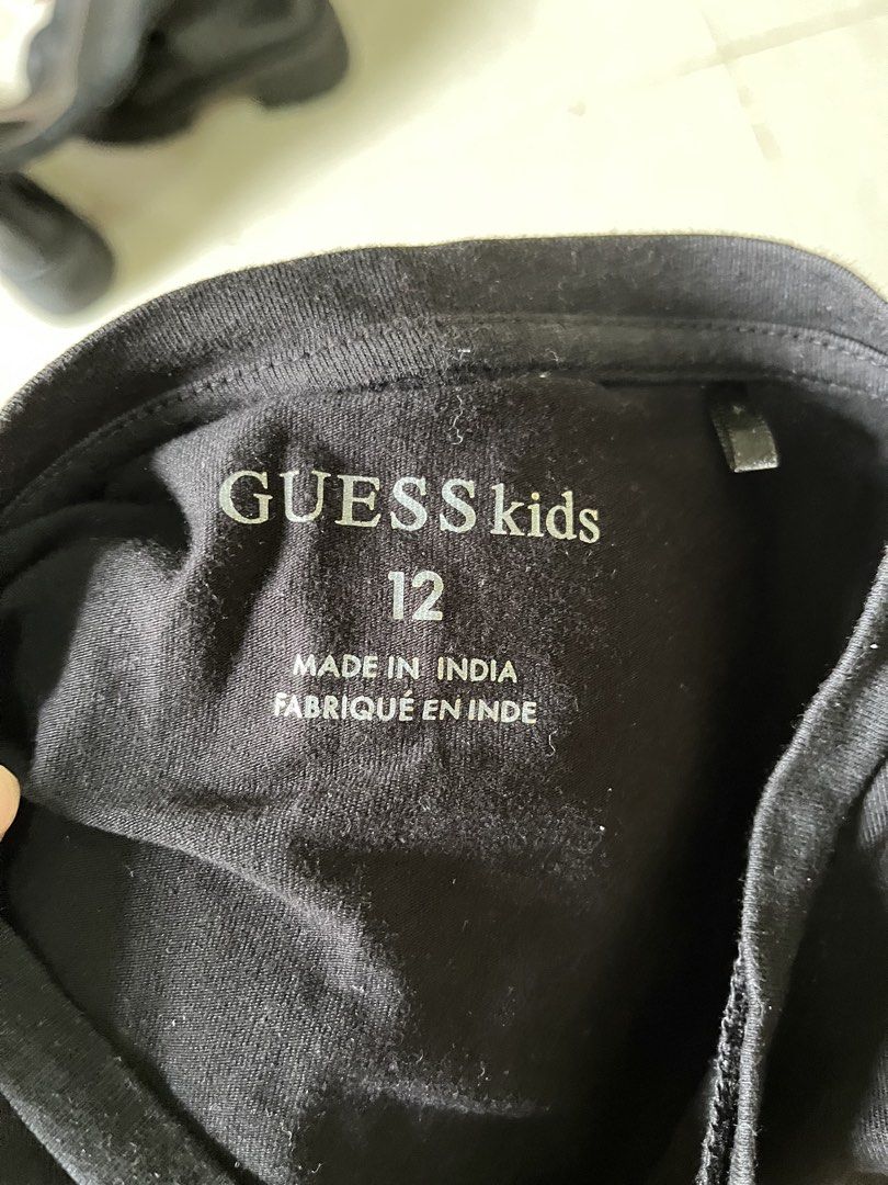 Guess Black Shirt (Category: Shirts) located in Cabanatuan. Submitted by winx_closeth (Listing ID 1469831954, Image 2). Description: 12 yr old kids, but can fit to xs-small women.