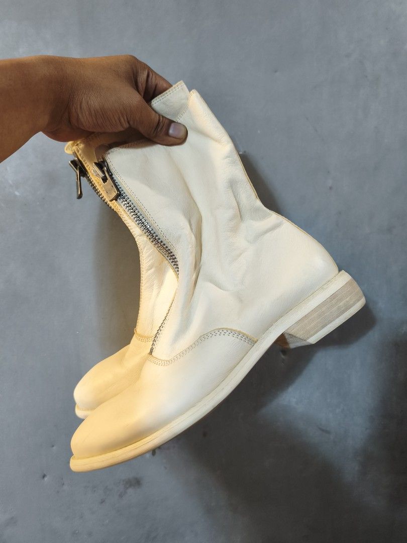 Guidi 310 Front Zip Boots K25 (Category: Boots) located in Taytay. Submitted by bunsoanglo096 (Listing ID 1469874063, Image 2). Description: - Size: 38 (marked on sole) - Style: Mid-calf white leather boots with edgy front zippers and chunky low heels - Condition: Clean, soft leather uppers with minimal wear on bottom treads - Quality: Sturdy construction featuring smoothly working metal hardware.