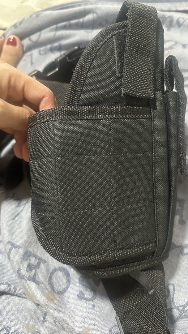 Gun holster (Category: Other Sports Equipment and Supplies) located in Caloocan City. Submitted by trebdy01 (Listing ID 1469783905, Image 3). Description: 🖤 BLACK TACTICAL GUN HOLSTER – UNISEX Looking for a practical tactical holster? This black nylon gun holder features adjustable straps and secure buckle closures for a comfortable fit. Suitable for both men and women. ✨ Durable nylon material ✨ Adjustable straps ✨ Lightweight and practical des