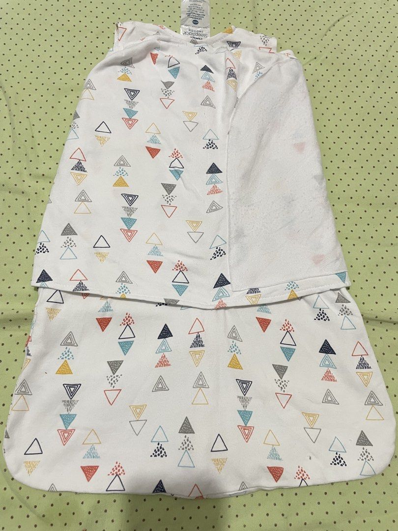 HALO SleepSack Swaddle Newborn Triangle Print (Category: Babies & Kids Fashion) located in San Jose del Monte. Submitted by momma_buys (Listing ID 1469830718, Image 3). Description: - Brand: HALO SleepSack Swaddle - Size: Newborn (Fits birth to 3 months, 6-12 lbs) - Design: Colorful triangle pattern on white background - Material: 100% breathable cotton for safe and cozy sleep - Features: Adjustable wrap wings for a secure fit and inverted zipper