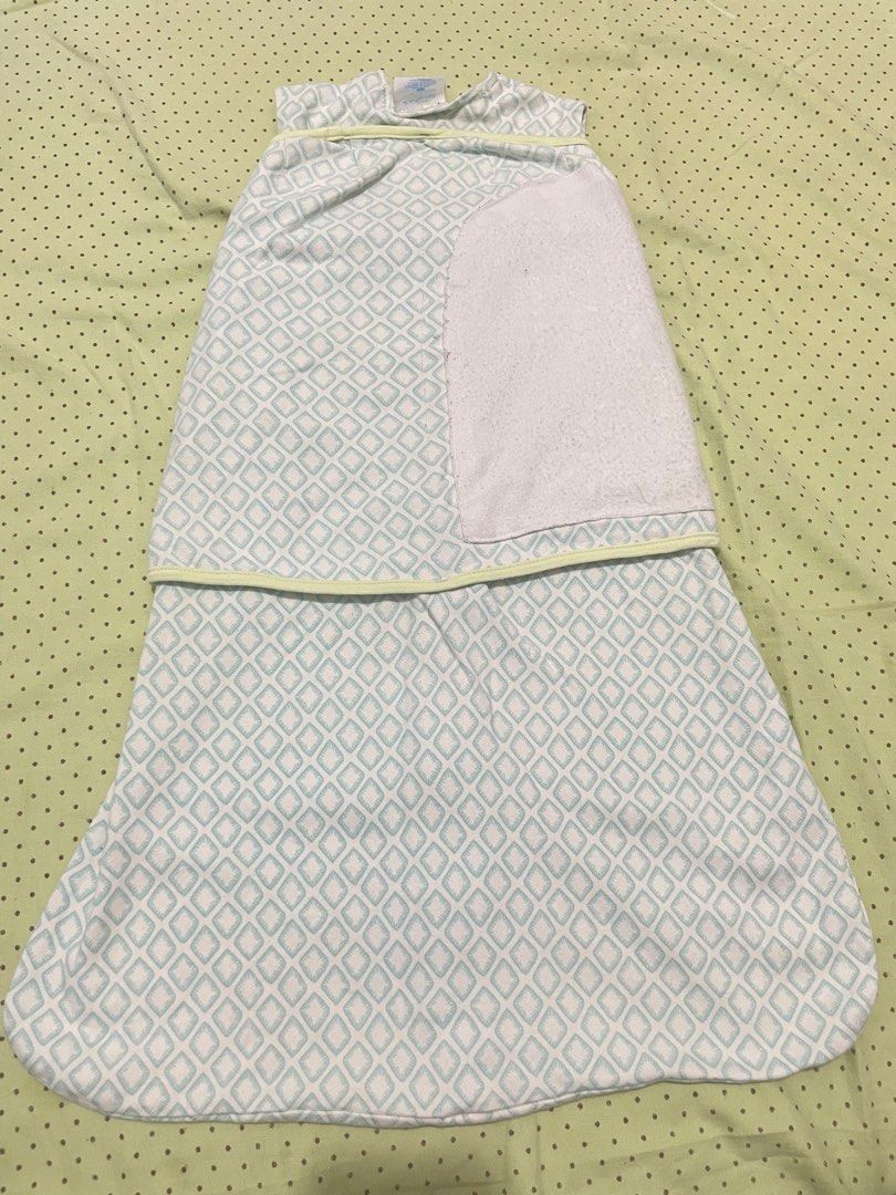 HALO SleepSack Swaddle Size S Elephant (Category: Babies & Kids Fashion) located in San Jose del Monte. Submitted by momma_buys (Listing ID 1469830506, Image 3). Description: - Brand: HALO SleepSack Swaddle - Size: Small (0-6 months, fits 13-18 lbs) - Design: Blue and white geometric diamond pattern with cute elephant 'Back is Best' applique - Features: Easy zipper design and adjustable wrap wings - Material: Soft 100% cotton for a cozy and secur
