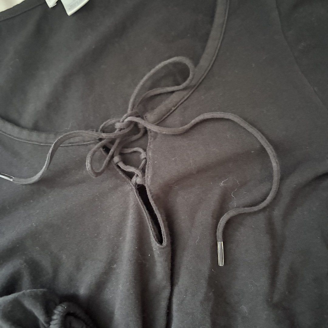 Halogen Black Long Sleeve Lace-Up Top Size S (Category: Longsleeves) located in Quezon City. Submitted by angelajuliet__ (Listing ID 1469765726, Image 3). Description: - Brand/Style: Halogen black long sleeve top - Size: S - Neckline: Scoop neck with lace-up string detail and metal aglets - Fabric & Fit: Soft knit fabric with gathered cuffs - Condition/Use: Simple and comfortable everyday basic shirt.