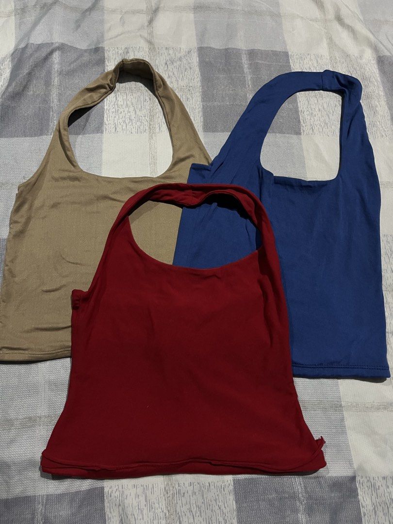 Halter Crop Tops Bundle (Beige, Red, Blue) (Category: Sleeveless) located in Legazpi City. Submitted by chynnunez (Listing ID 1469877156, Image 1). Description: - Set of 3 halter neck tops (beige, red, and blue) - Stretchy and comfortable snug fit - Versatile for casual days or nights out - Sold as a bundle.