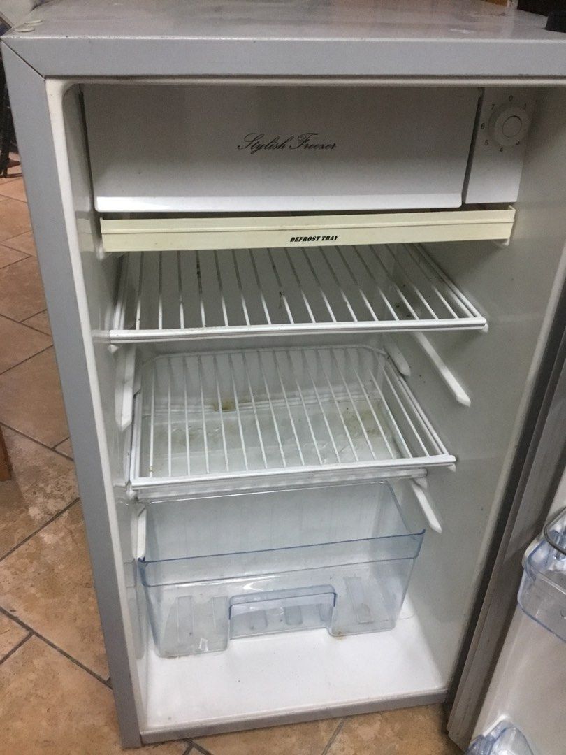 Hanabishi Single Door Refrigerator with Freezer (Category: Refrigerators and Freezers) located in Manila. Submitted by roberto.enriquez (Listing ID 1469818325, Image 2). Description: - Brand: Hanabishi - Color: Silver finish with stylish black top trim - Type: Compact single-door mini fridge with internal freezer compartment - Storage Features: 2 adjustable wire shelves, crisper drawer, and 3 door bins with egg storage - Extras: Includes defrost 