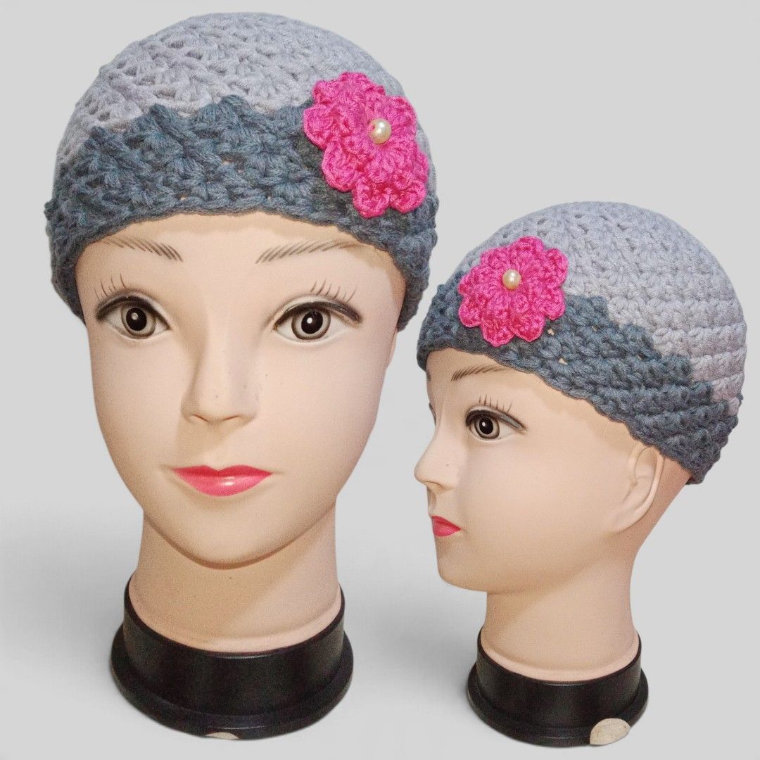 Handmade crochet beanie hat (Category: Hats & Beanies) located in Castillejos. Submitted by alyssa78 (Listing ID 1469806514, Image 1). Description: - Cute matching mother and child beanie set - Handmade crochet style in light grey with a dark grey textured brim - Accented with a bright pink crochet flower and a white pearl center - Made from soft yarn for a cozy fit - Perfect for autumn, winter, or matching outfit photos.