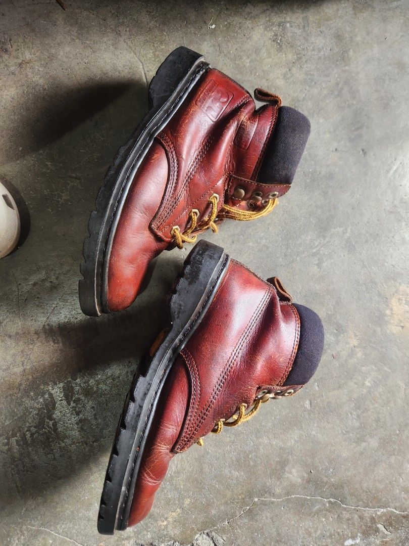 Hawkins Leather Work Boots Brown (Category: Boots) located in Quezon City. Submitted by amber___18 (Listing ID 1469791396, Image 2). Description: - Brand: Hawkins - Color: Rich brown leather with black padded ankle collar - Soles: Durable lug soles with solid grip - Laces: Yellow and brown braided laces - Condition: Shows natural creasing and scuffs from regular wear, sturdy and built to last - Best for: Outdoor tasks, heavy-duty use, and rugged 