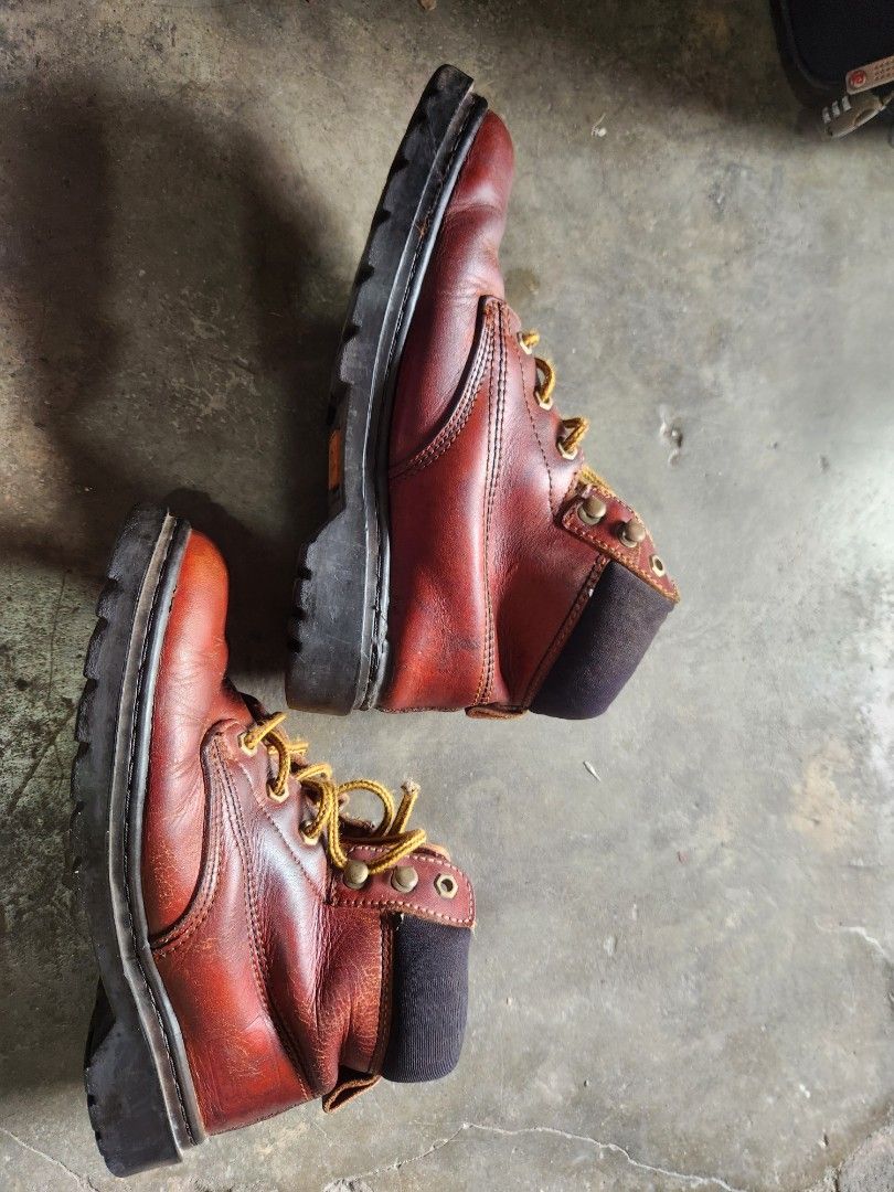 Hawkins Leather Work Boots Brown (Category: Boots) located in Quezon City. Submitted by amber___18 (Listing ID 1469791396, Image 3). Description: - Brand: Hawkins - Color: Rich brown leather with black padded ankle collar - Soles: Durable lug soles with solid grip - Laces: Yellow and brown braided laces - Condition: Shows natural creasing and scuffs from regular wear, sturdy and built to last - Best for: Outdoor tasks, heavy-duty use, and rugged 