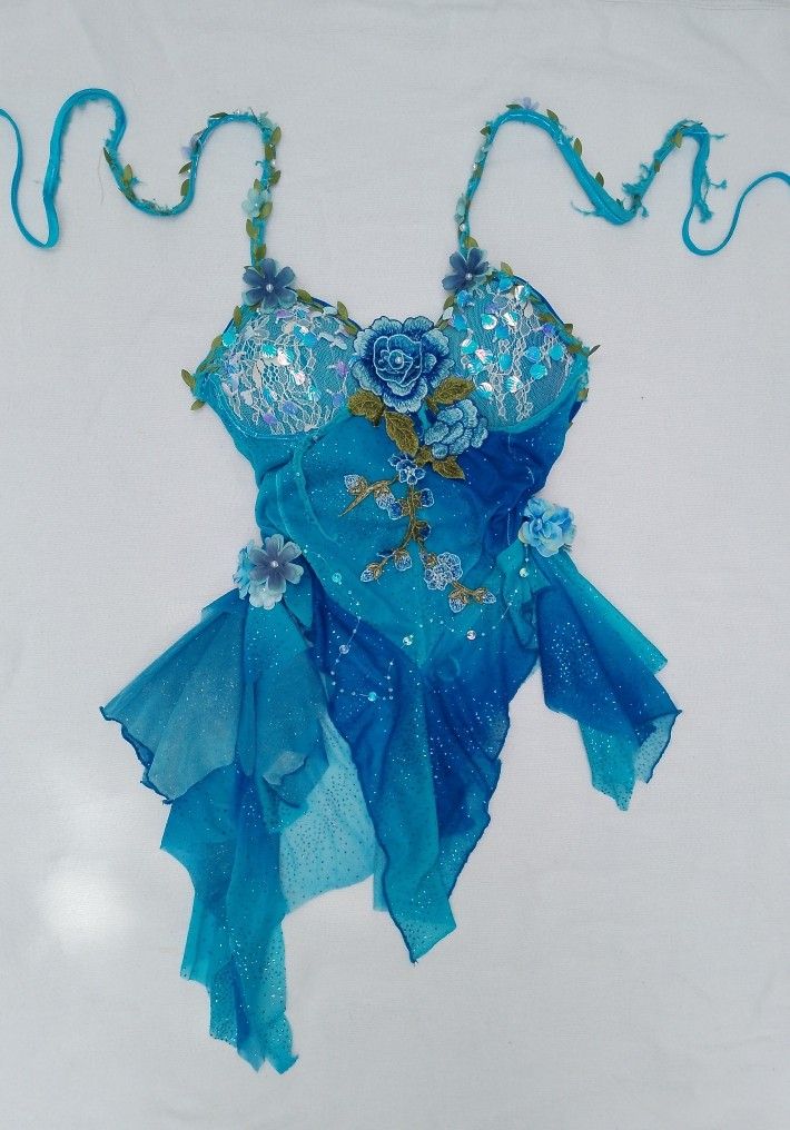 OCEAN BLOOM FAIRY TOP (Category: Sleeveless) located in Laur. Submitted by zystilo (Listing ID 1469876354, Image 1). Description: 🧚🏻‍♀️₊˚⊹ 𓇼THE OCEAN BLOOM FAIRY TOP 𓆝⋆｡˚ 𓇼 — size : xs - m — mannequin measurements: bust : 34”| waistline : 27” — adjustable back — reworked 🧚🏻‍♀️ A LITTLE NOTE ABOUT OUR REWORKED PIECES ♡ please keep in mind that these are handmade and reworked pieces, so stitches may not be perfectly even, and minor imperfect
