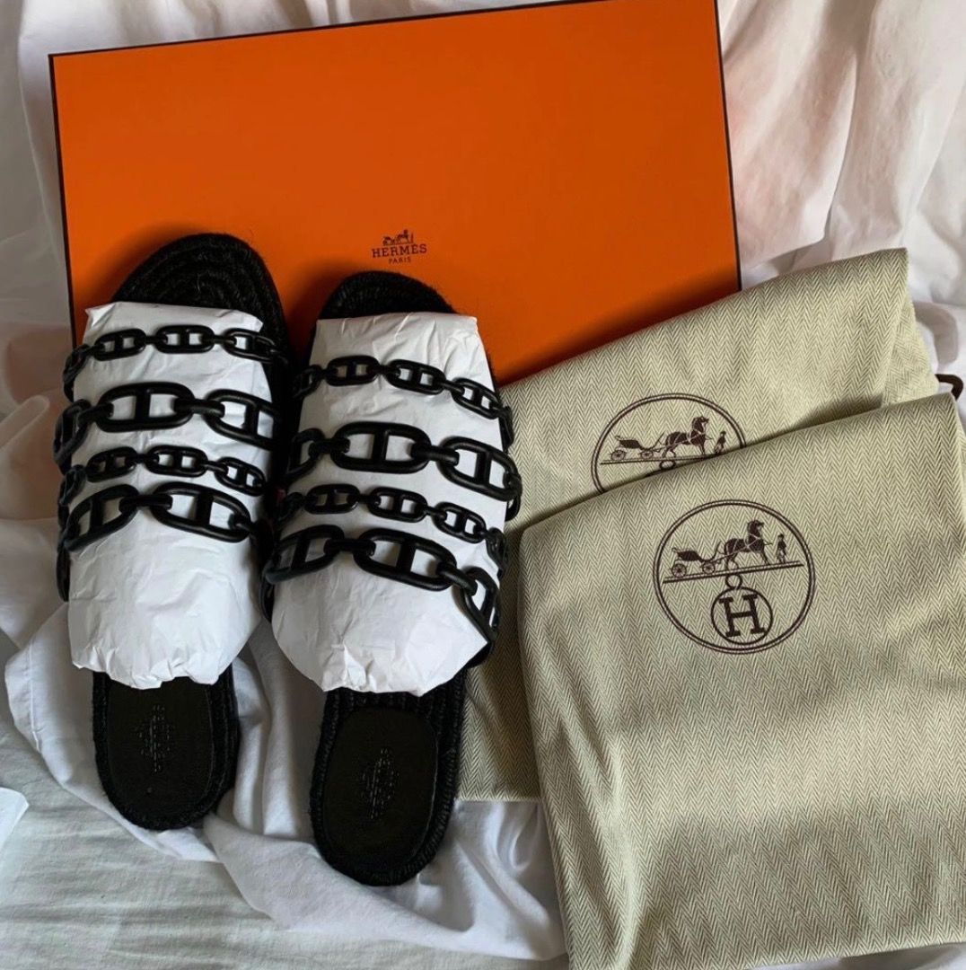 Hermes Ancone Espadrille Sandals Size 39 (Category: Sneakers & Footwear) located in Quezon City. Submitted by lavishly.ph (Listing ID 1469759749, Image 1). Description: - Brand: Hermes - Style: Slip-on espadrille with black chain strap details - Size: 39 - Origin: Made in Spain (stamped soles) - Inclusions: Original orange storage box and 2 dust bags - Condition: Excellent/Pristine.