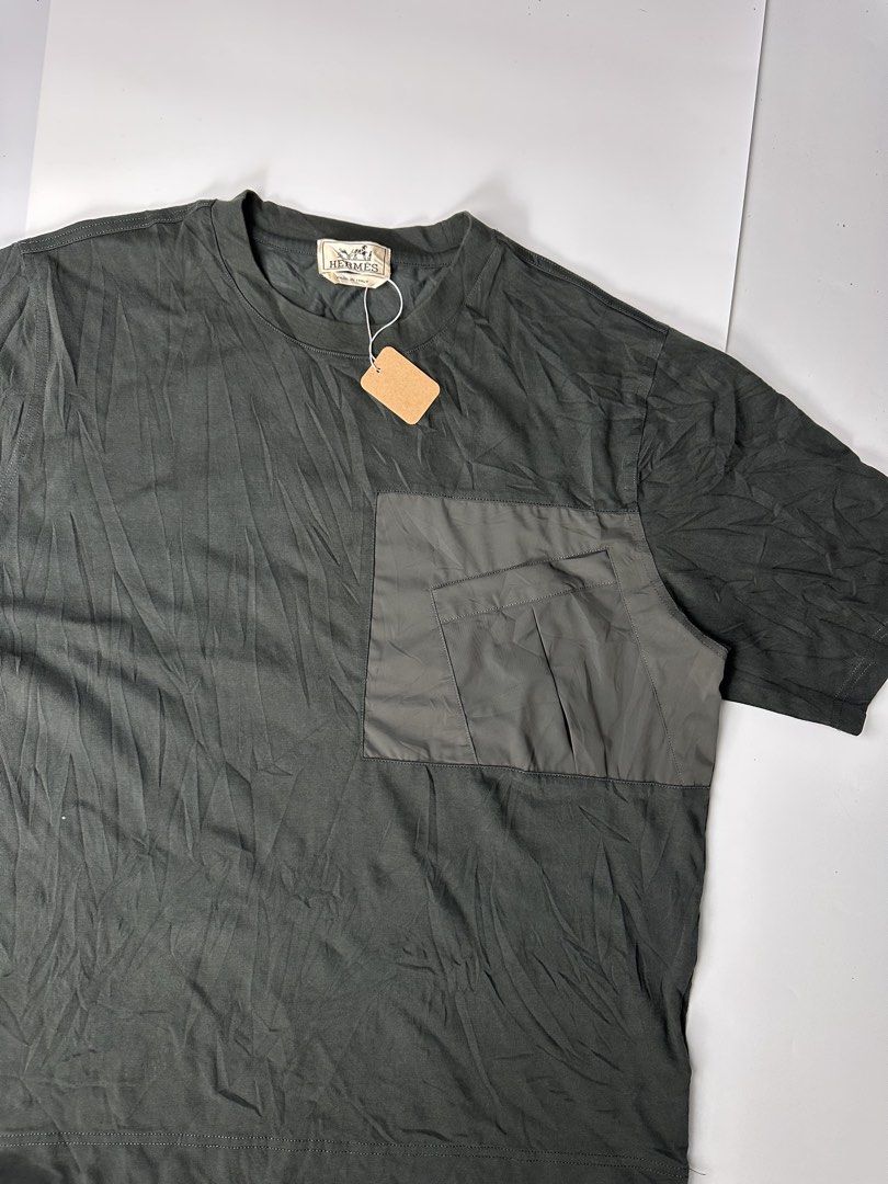 Hermés Asymmetrical Pocket Tee (Category: Activewear) located in Bacolod City. Submitted by 2k.archives (Listing ID 1469794490, Image 2). Description: • Good Asnew • Flawless • Size 2XL Tagged • 23 Width • 28 Length.