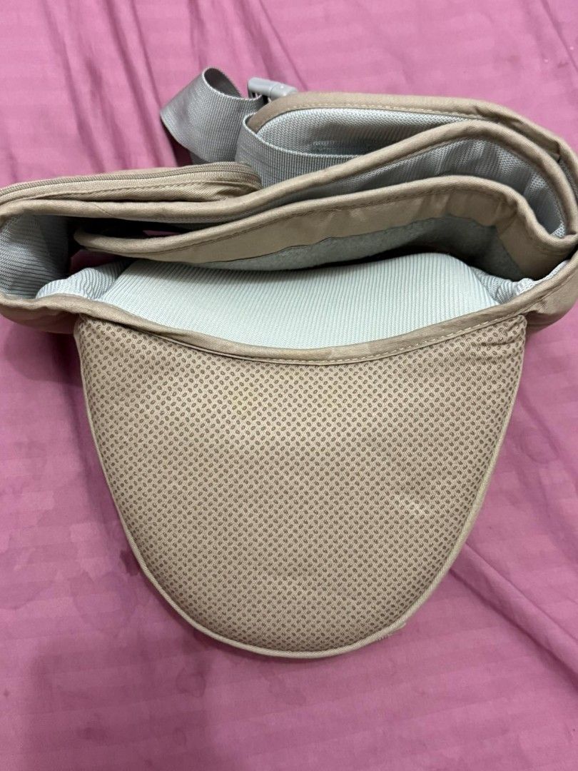 Hip Seat Carrier (Category: Carriers & Slings) located in Manila. Submitted by joshdavid9923 (Listing ID 1469939019, Image 2). Description: - Brand: Baby Company - Type: 6-way ergonomic hip seat baby carrier - Color: khaki and gray - Storage: Multiple convenient zippered pockets - Ergonomics: Even weight distribution for parent and baby - Inclusion: Original box included -No hood included -Used only twice -Good as new.