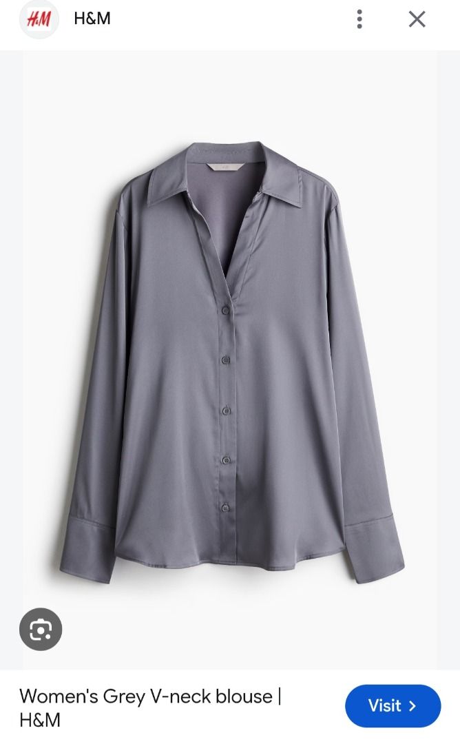 H&M Grey V-Neck Button-Down Blouse (Category: Blouses) located in Manila. Submitted by katkween23 (Listing ID 1469765486, Image 1). Description: - Brand: H&M - Size: M - Color: Grey - Material: Smooth satin-like fabric - Design: Deep V-neckline, classic collar, and long sleeves with wide cuffs - Condition: Clean, no flaws noticed - Versatility: Perfect for office wear or dressed down with jeans.