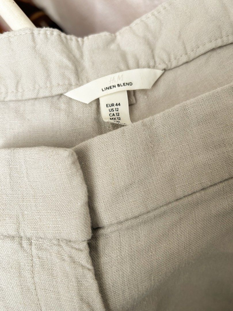 H&M Linen Blend Beige Pants/ Trousers (Category: Other Bottoms) located in Cainta. Submitted by unboxingstuff (Listing ID 1469820234, Image 3). Description: - Brand: H&M - Color: Beige - Size: US 12 / EUR 44 - Material: Lightweight linen blend, ideal for any weather - Details: Front zip fly with hook-and-eye and button closure, pleated front, belt loops, and functional side pockets .