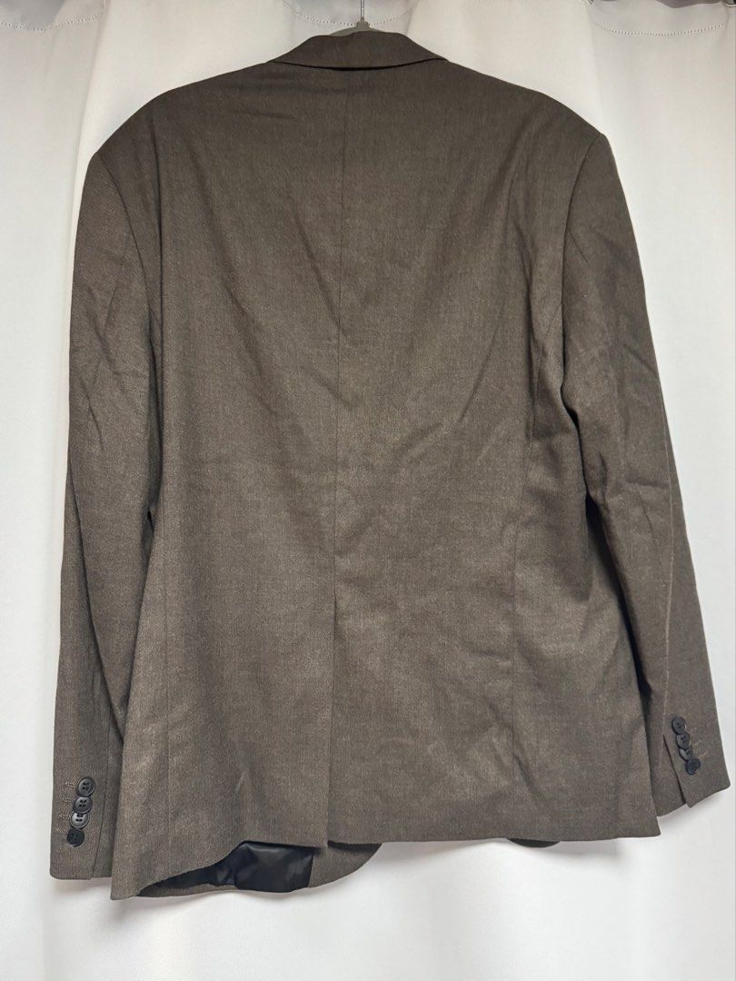 H&M Men’s Brown Regular Fit Blazer (Category: Coats, Jackets and Outerwear) located in Calamba. Submitted by cheriiv (Listing ID 1469791588, Image 2). Description: Worn once - Brand/Style: H&M Regular Fit Brown Blazer - Size: 36R / EUR 46 - Material: Polyester, viscose, and elastane blend (fully lined) - Details: Two front button closure, side patch pockets, multi-button cuffs.