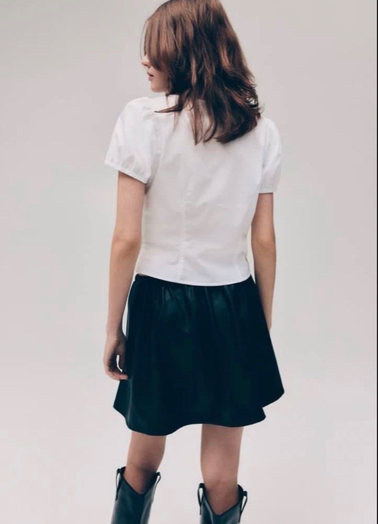 H&M White Puff Sleeve Bow Poplin Blouse (Category: Blouses) located in Cabuyao City. Submitted by butters123 (Listing ID 1469867706, Image 2). Description: - Brand: H&M Divided - Color: White - Style: Short sleeve cropped top with square neckline Rfs: too small on me.