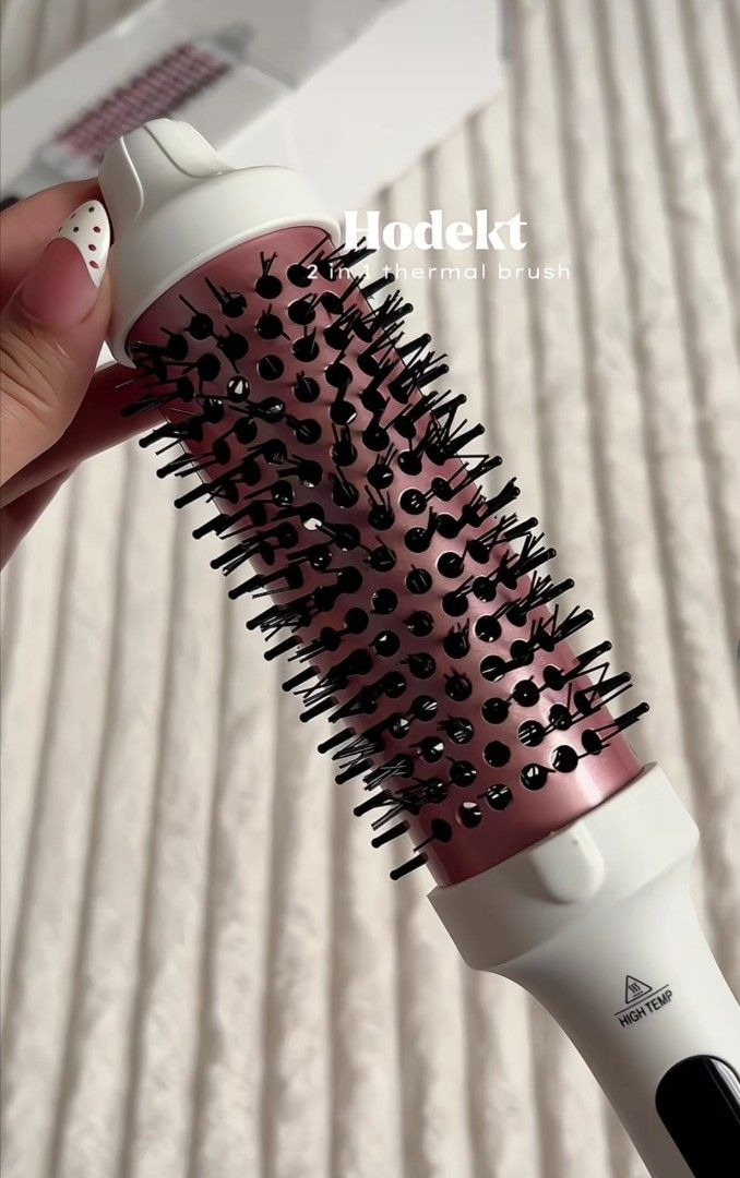 Hodekt 2 in 1 thermal brush (Category: Hair) located in San Jose del Monte. Submitted by vakadela54883 (Listing ID 1469943735, Image 1). Description: - Brand: Hodekt 2-in-1 Thermal Brush - Color: Rose Gold and White - Easy Curls: Hold on hair ends for 5 seconds for long-lasting curls - Safety Feature: High-temp warning symbol on the handle - Convenient Design: Side-mounted on/off switch - Perfect for: Quick hair styling and touch-ups anytime.