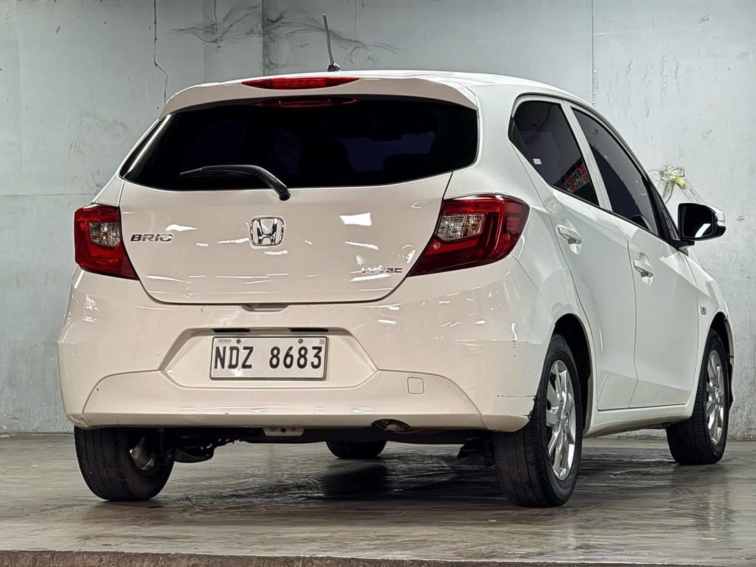 Honda Brio V Auto (Category: Used Cars) located in Manila. Submitted by quality_cars (Listing ID 1469925435, Image 3). Description: FOR SALE / FINANCING For Cash Price: 393k Fix Price For Financing: All in Dp 84k, 11k Monthly Well Maintained, Legit First Owner Acquired 💯 2021 Honda Brio V Automatic Transmission 15Km/L Fuel Consumption 100% Original Paint Fresh Interior Cold A/C System No Engine Issues No Underchassis Noises Complete Original Doc