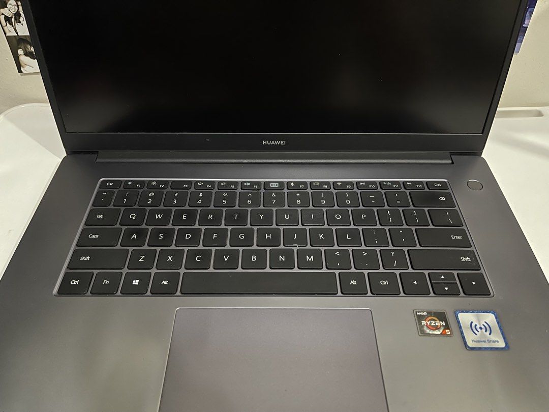 Huawei MateBook D 15 Ryzen 5 (Category: Laptops & Notebooks) located in Manila. Submitted by decluttersbynini (Listing ID 1469779827, Image 2). Description: - Model: Huawei MateBook D 15 - Color: Dark Grey - Processor: AMD Ryzen 5 3500U - Memory: 8GB RAM - Storage: 477GB - OS: Windows 11 Home Single Language - Keyboard: QWERTY layout with integrated touchpad - Security: Power button fingerprint reader - Condition: Well used - Issue: Minor scratch