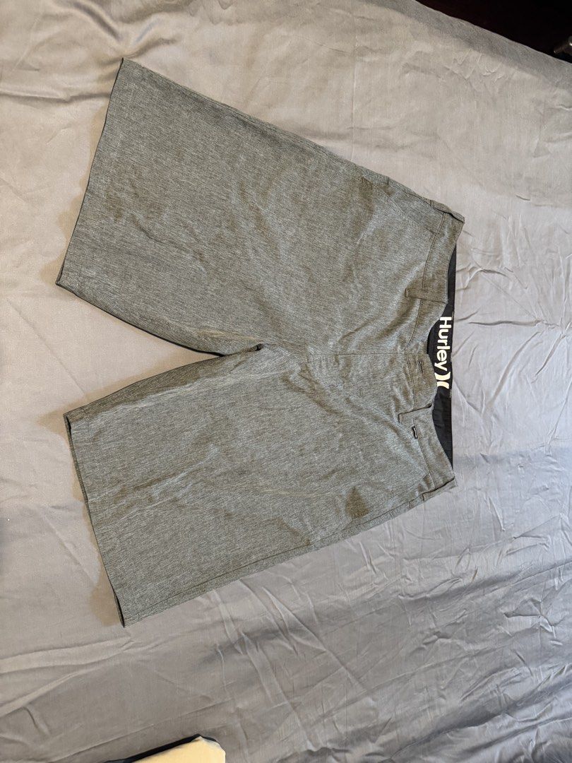 Hurley Phantom Men's Gray Boardshorts Size 34 (Category: Swim Trunks & Board Shorts) located in Taguig. Submitted by dependingonvibe (Listing ID 1469783833, Image 1). Description: - Brand: Hurley Phantom (guaranteed authentic) - Color: Versatile Gray Heather - Size: 34 - Material: Flexible recycled polyester & spandex blend for maximum mobility - Features: Two rear button pockets & signature waistband branding - Condition: Excellent, clean interi