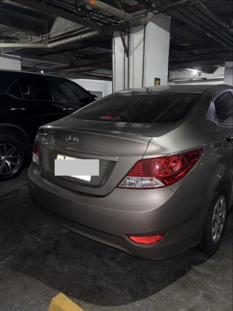 Hyundai Accent 1.4 GL (A) (Category: Used Cars) located in Mandaluyong City. Submitted by wear_your_style (Listing ID 1469779162, Image 3). Description: Location: Wack Wack, Mandaluyong. Very low mileage of 41,000. Never been flooded. City drive only. Chrome/bronze color. Issues: 1) LTO reg expired 2) May bangga sa right bumper (lamp side) pero umiilaw pa yan no problem 3) Mahina ang aircon, like matagal siya lumamig 4) Remote control is sira na 
